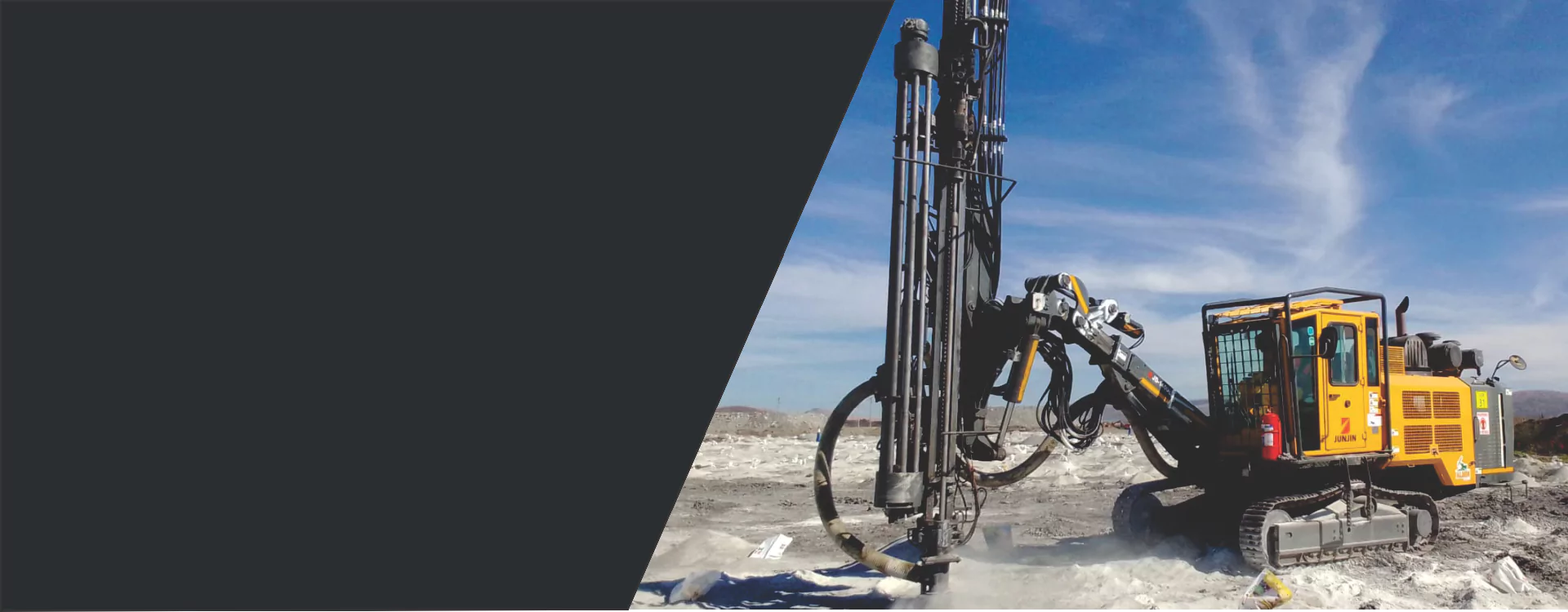 Junjin drill rig on an opencast mining bench in South Africa